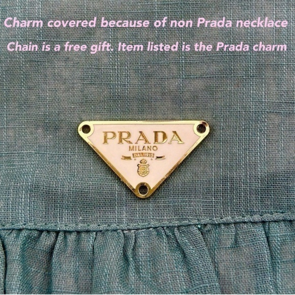 AUTHENTIC Prada charm for necklace or other personal item.